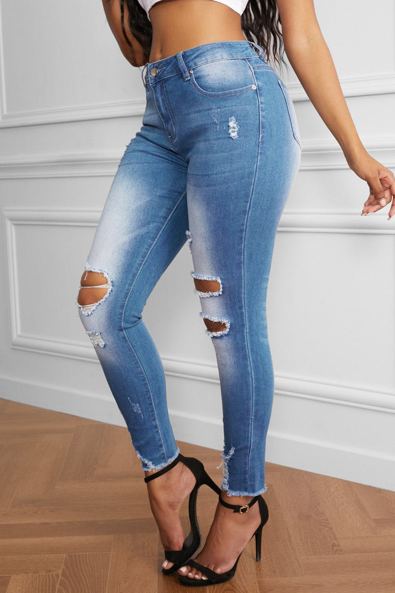 Women's Faded Mid High Rise Holes Skinny Jeans